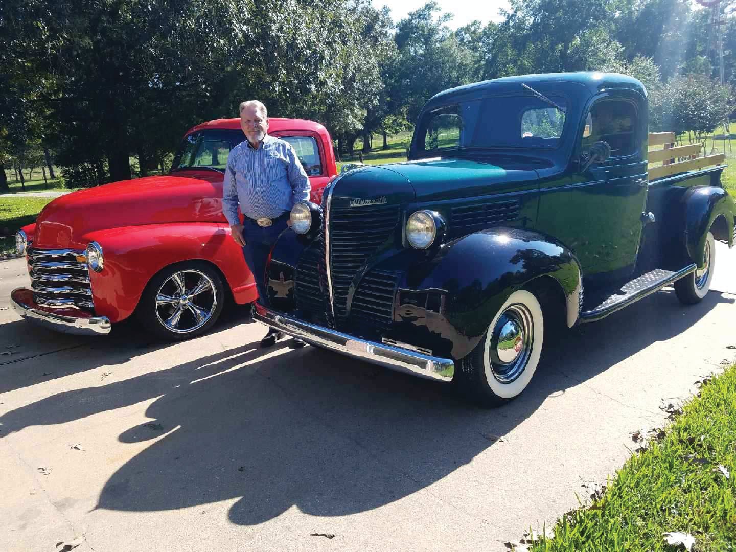 Chuck Siems with his classic trucks